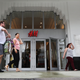 People walk past an H&M clothing store on Jan. 9, 2018, in Miami Beach, Fla. (Joe Raedle/Getty Images)